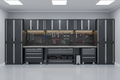 Garage Workspace System - full cabinet wall with heavy-duty workbench and tool organization