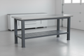 Heavy-duty garage workbench with steel top