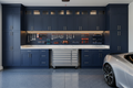 Premium Full-Wall System - showroom-quality floor-to-ceiling garage cabinets with integrated lighting